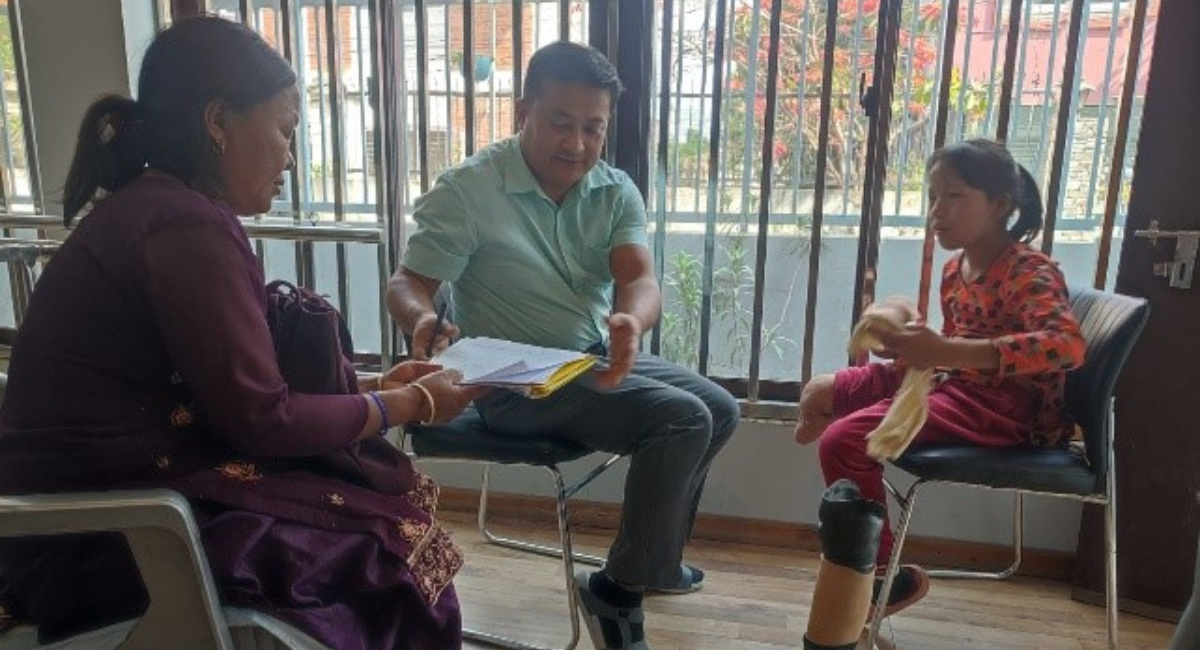 A group of people sitting in chairs.