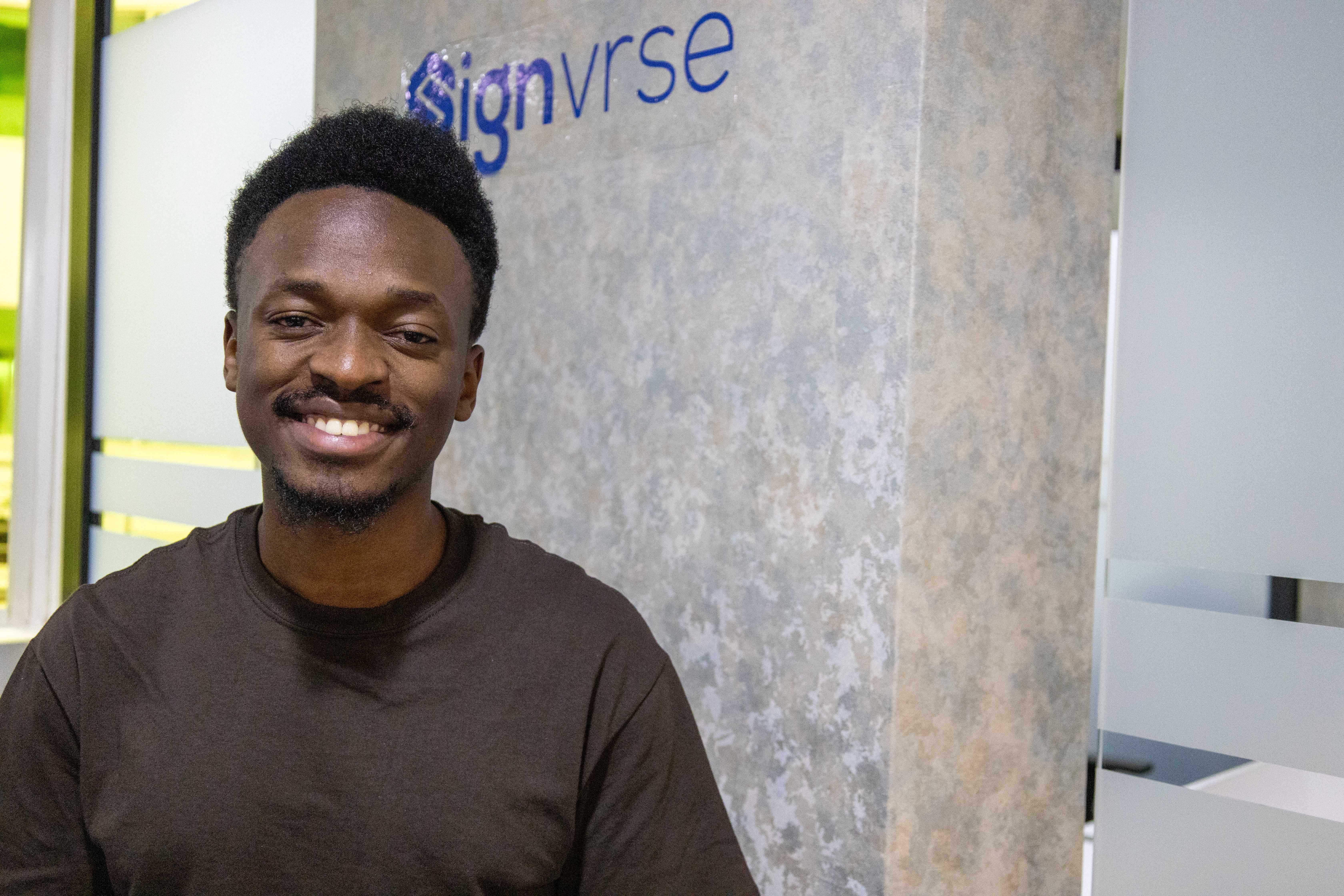 Elly showing his motion capture system used to record ign languages Cover Image