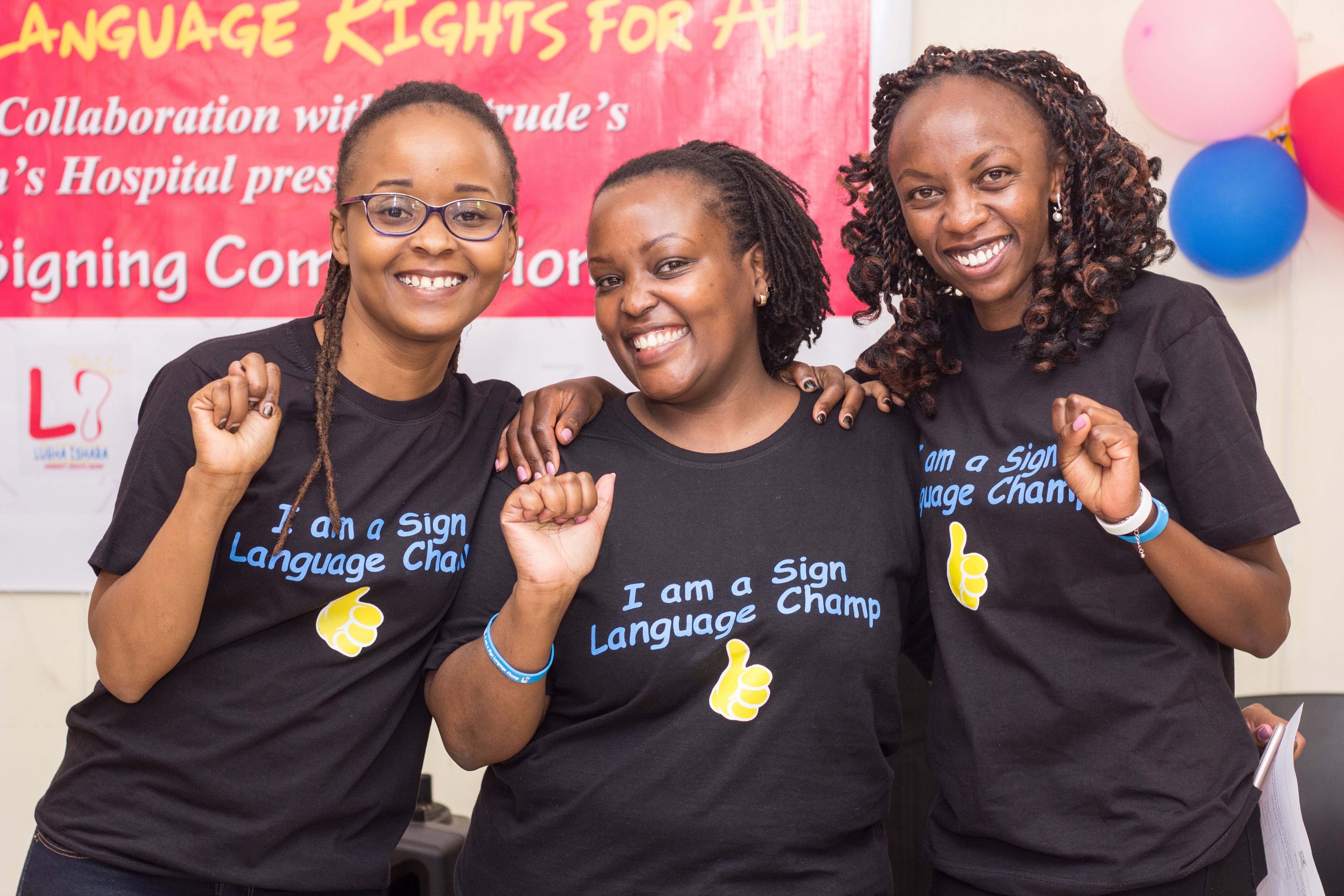 A photo of Lugha Ishara's founders from left Nancy Maina, Ann Karau, Susan Thuo. Cover Image