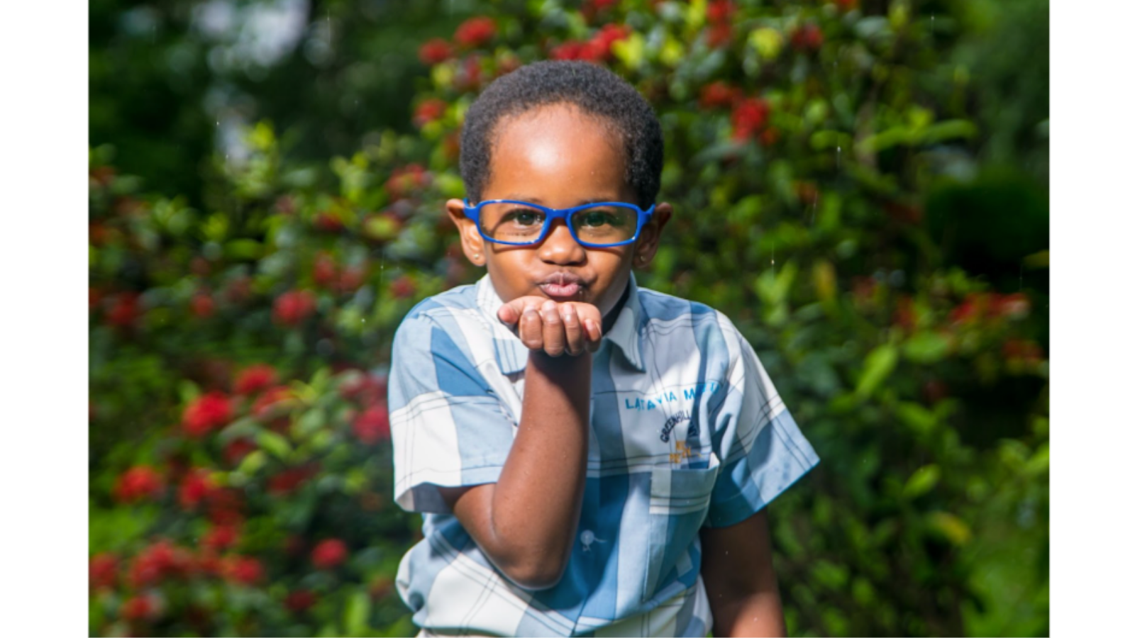 Image of young boy wearing Wazi glasses from AT impact fund programme Cover Image