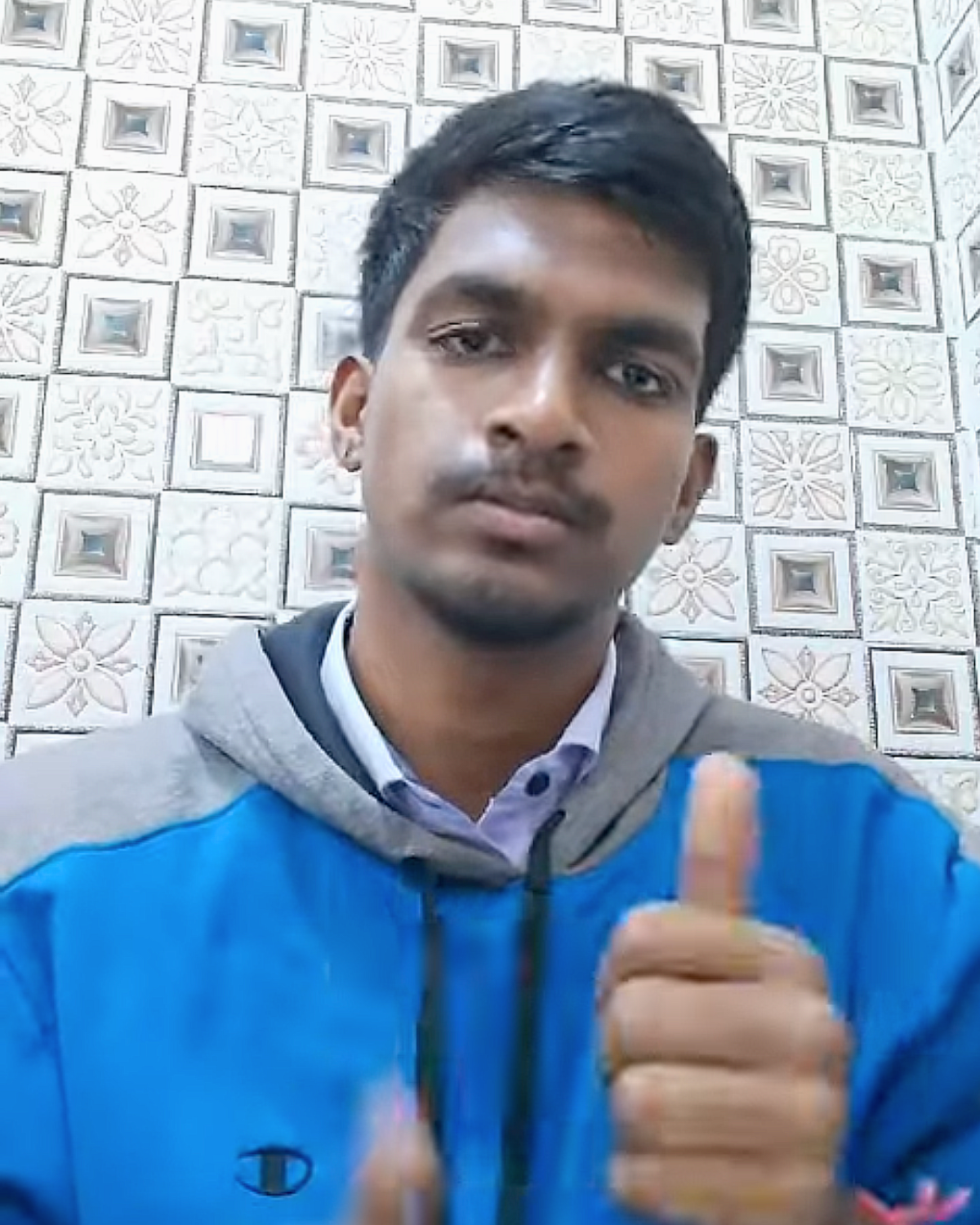 Bala Murugan signing to camera Cover Image