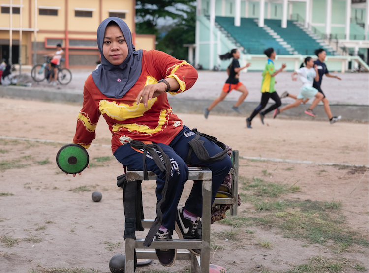 Rusmiyati, discus thrower & member of National Paralympic Committee Chapter Banjarmasin, Indonesia Cover Image