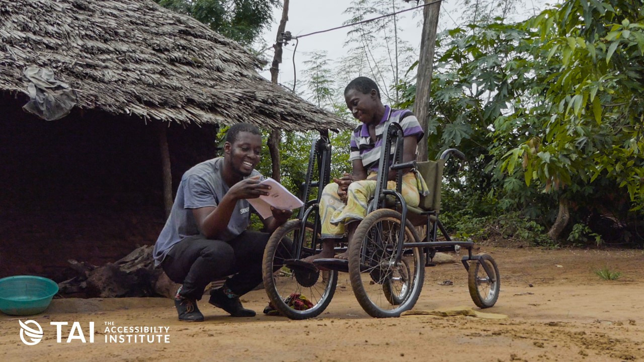 Co founder, Kenneth Mwarandu speaking to a user of the Safari seat. Cover Image