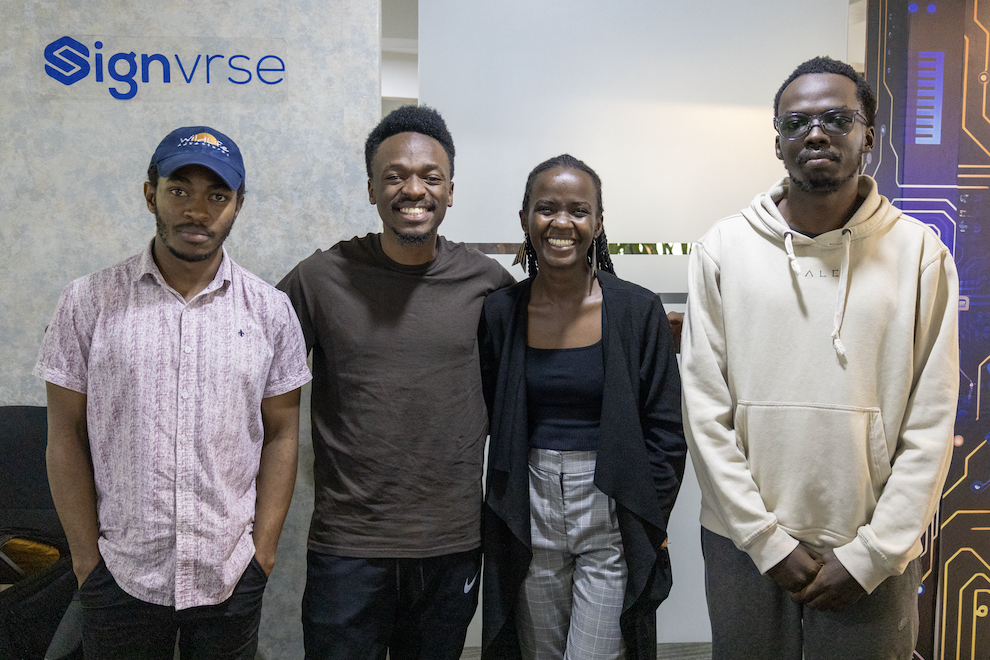 Elly with some members of his team