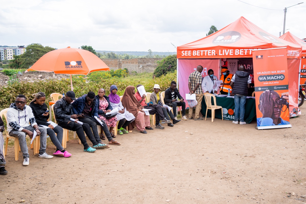 People waiting in line during one of the camps in order to get tested