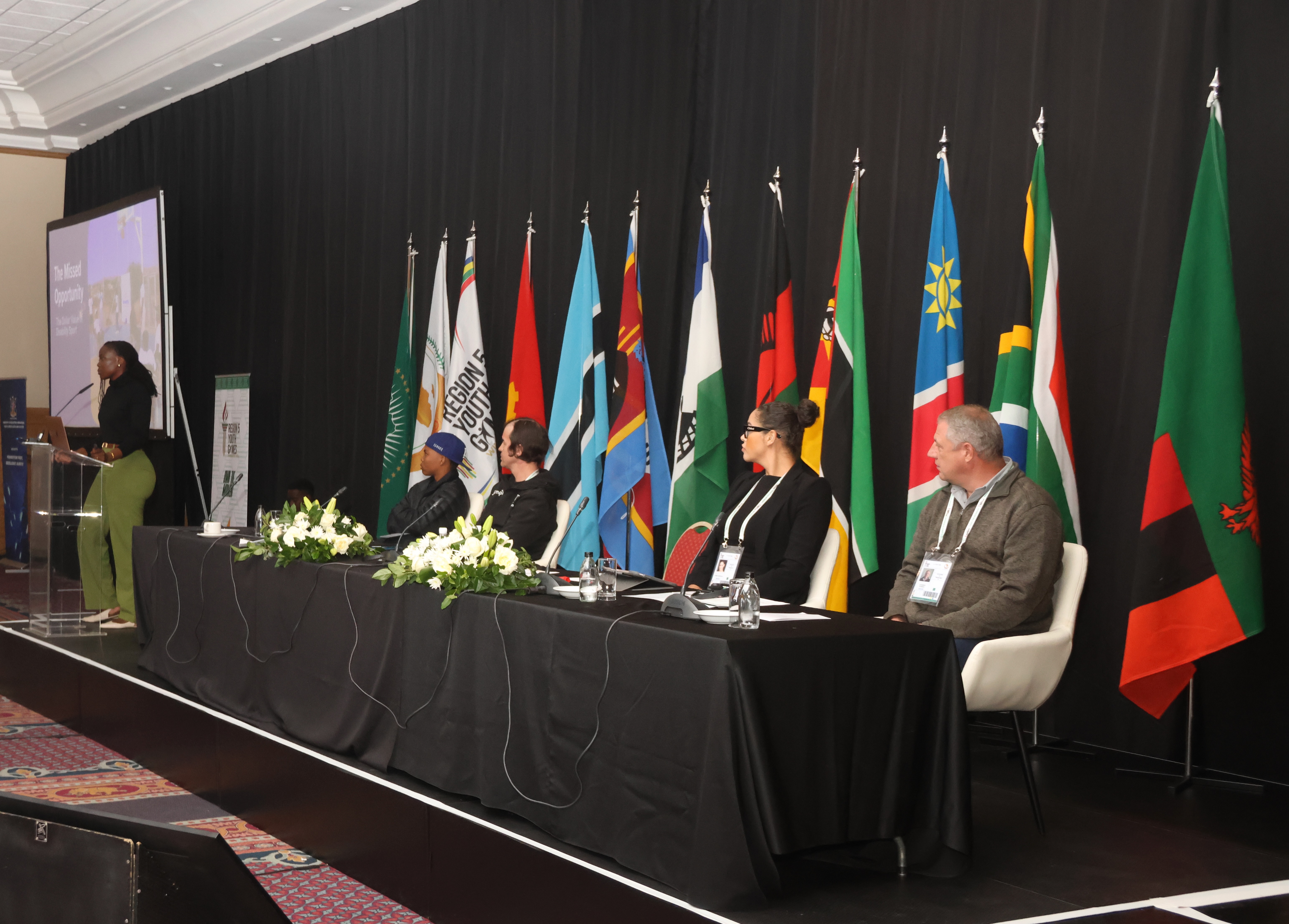 panel session at youth games ministerial forum with 5 panelists on stage