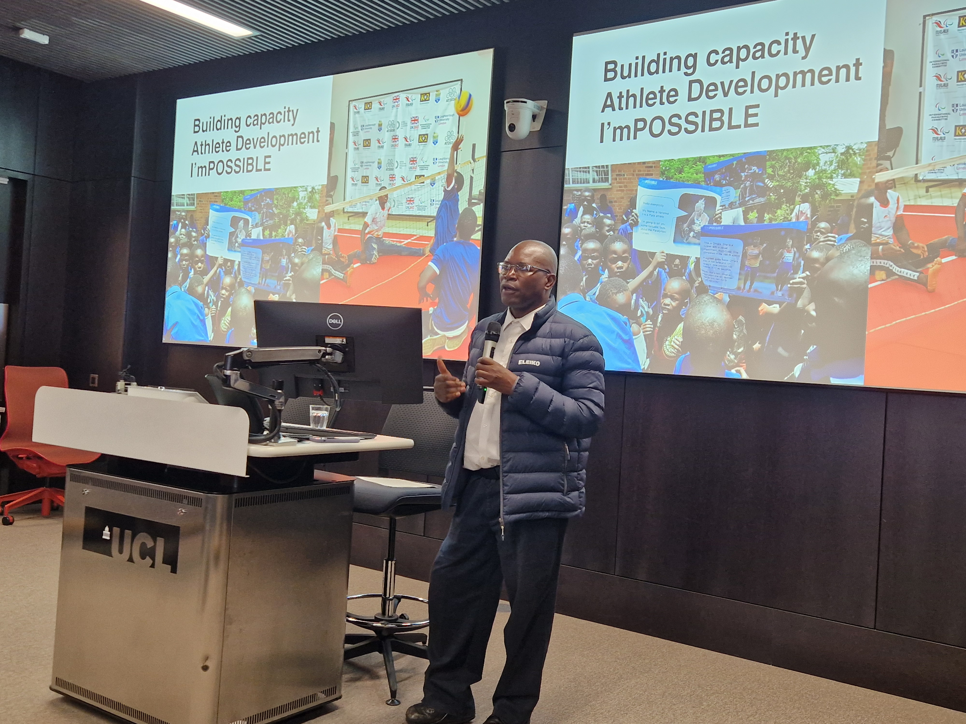 James, President Malawi Paralympic Committee, speaking in a lecture theatre to full audience 